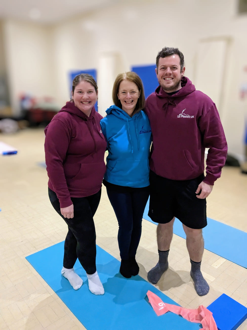 three people smiling at SR Pilates UK in Horsforth, Leeds, West Yorkshire