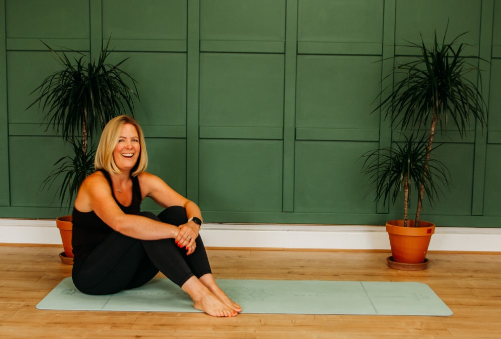 picture of Sarah, smiling at studio, SR Pilates UK, based in Horsforth, Leeds, West Yorkshire
